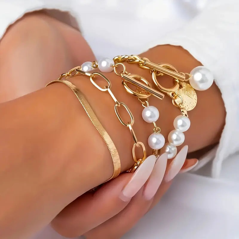 Chic Gold Bracelet Set of 4 – Featuring Snake, Beads, and Link Designs