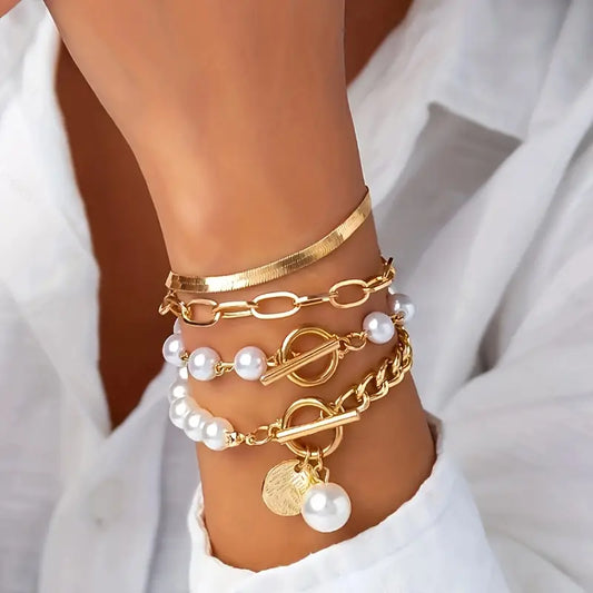 Chic Gold Bracelet Set of 4 – Featuring Snake, Beads, and Link Designs