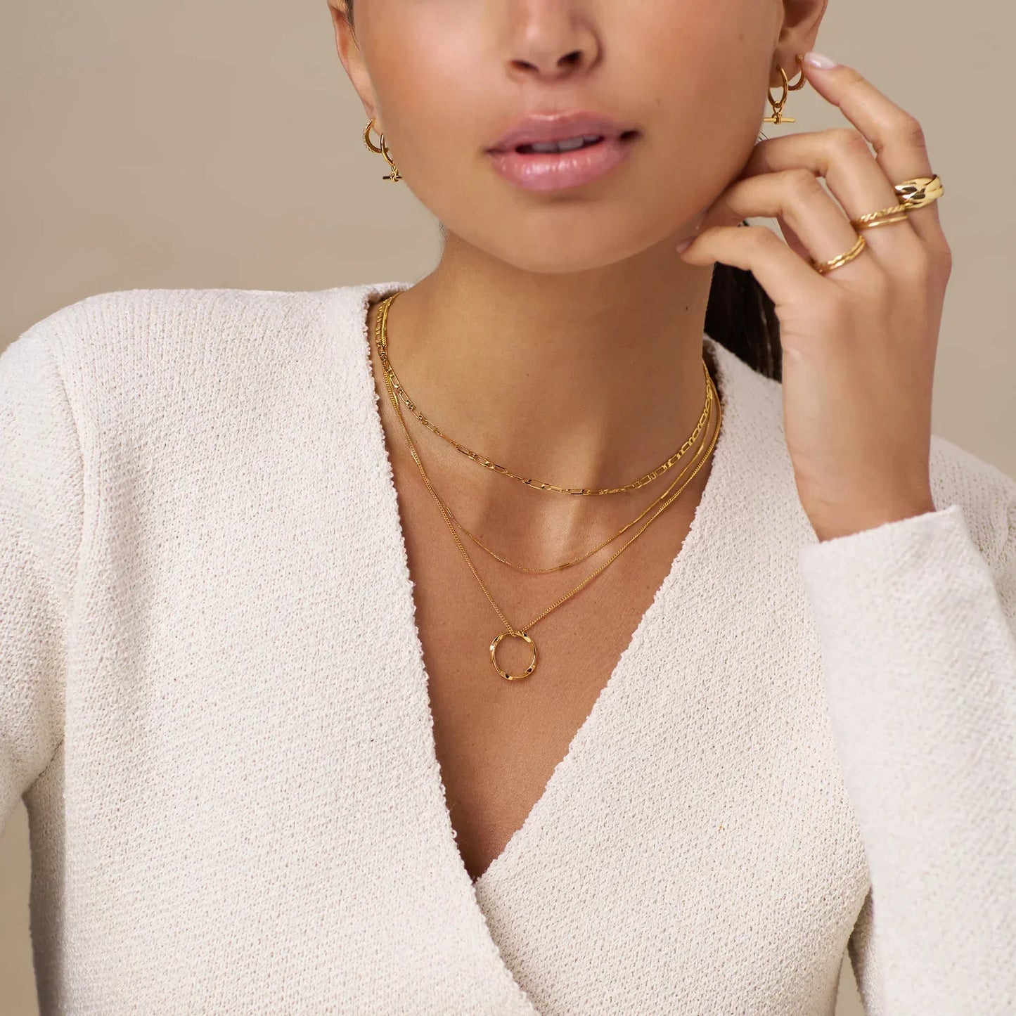Gold Three-Strand Necklace with Open Circle Design