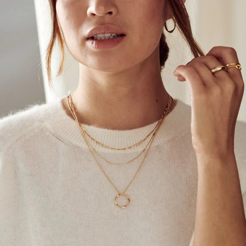 Gold Three-Strand Necklace with Open Circle Design
