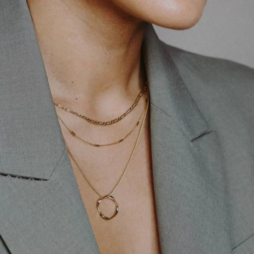 Gold Three-Strand Necklace with Open Circle Design