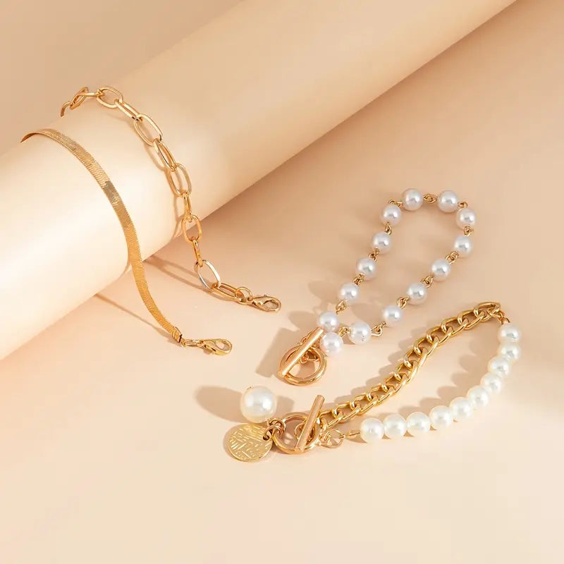 Chic Gold Bracelet Set of 4 – Featuring Snake, Beads, and Link Designs